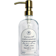 Clear glass Mustard Seed multipurpose Gratitude Bottle with gold pump.