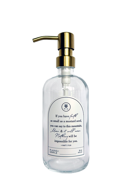 Clear glass Mustard Seed multipurpose Gratitude Bottle with gold pump.