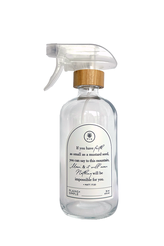 Clear glass Mustard Seed multipurpose Gratitude Bottle with spray pump.