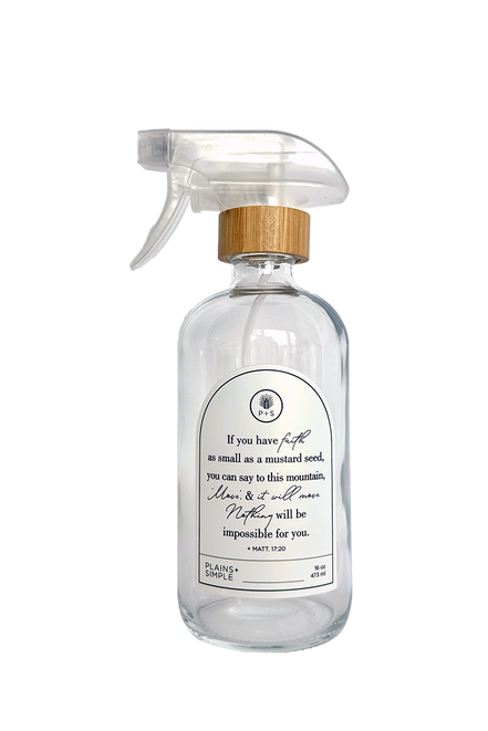 Clear glass Mustard Seed multipurpose Gratitude Bottle with spray pump.