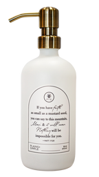 White glass Mustard Seed multipurpose Gratitude Bottle with gold pump.