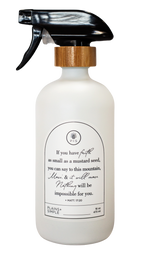 White glass Mustard Seed multipurpose Gratitude Bottle with spray pump.