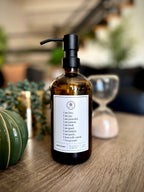 Amber glass Fruits of the Spirit dish soap Gratitude Bottle with black pump with beautiful decor items.