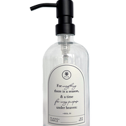 Clear glass Seasons multipurpose Gratitude Bottle with black pump.