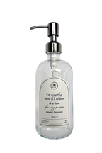 Clear glass Seasons multipurpose Gratitude Bottle with silver pump.