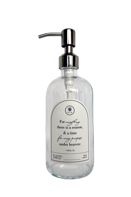 Clear glass Seasons multipurpose Gratitude Bottle with silver pump.