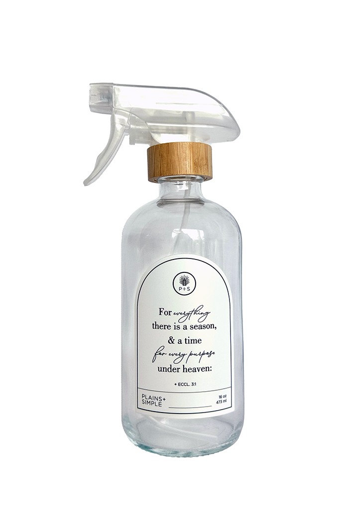 Clear glass Seasons multipurpose Gratitude Bottle with spray pump.