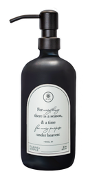 Black glass Seasons multipurpose Gratitude Bottle with black pump.