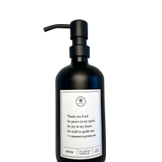 Black glass Thank You Lord lotion Gratitude Bottle with black pump.