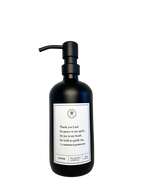 Black glass Thank You Lord lotion Gratitude Bottle with black pump.