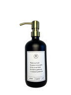 Black glass Thank You Lord lotion Gratitude Bottle with gold pump.