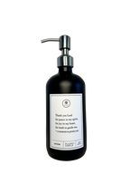 Black glass Thank You Lord lotion Gratitude Bottle with silver pump.