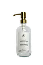 Clear glass Thank You Lord lotion Gratitude Bottle with gold pump.