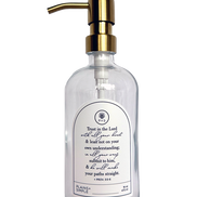 Clear glass Trust multipurpose Gratitude Bottle with gold pump.