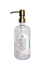 Clear glass Trust multipurpose Gratitude Bottle with gold pump.
