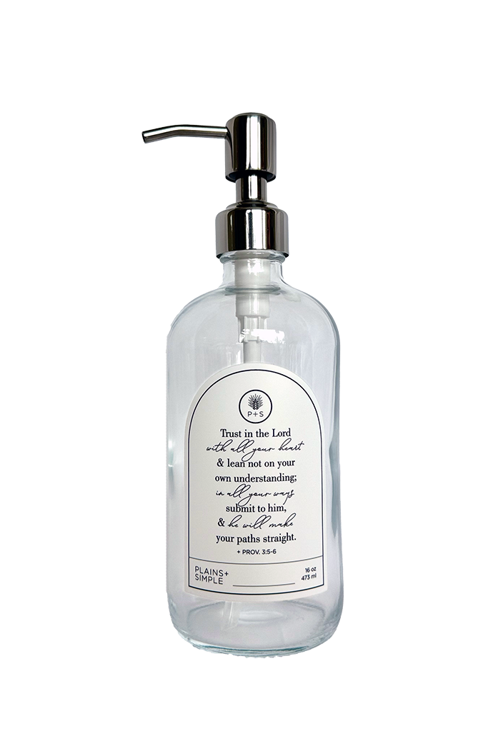 Clear glass Trust multipurpose Gratitude Bottle with silver pump.