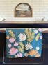 Wildflower multipurpose towel hanging in the kitchen, bringing brightness to the space and to your mind.